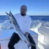 Captain Kareem at the helm